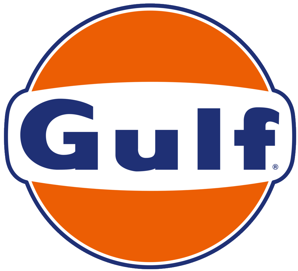 Close-up view of the printed vintage Gulf Oil logo in bold orange and blue on the front of a classic polo shirt.